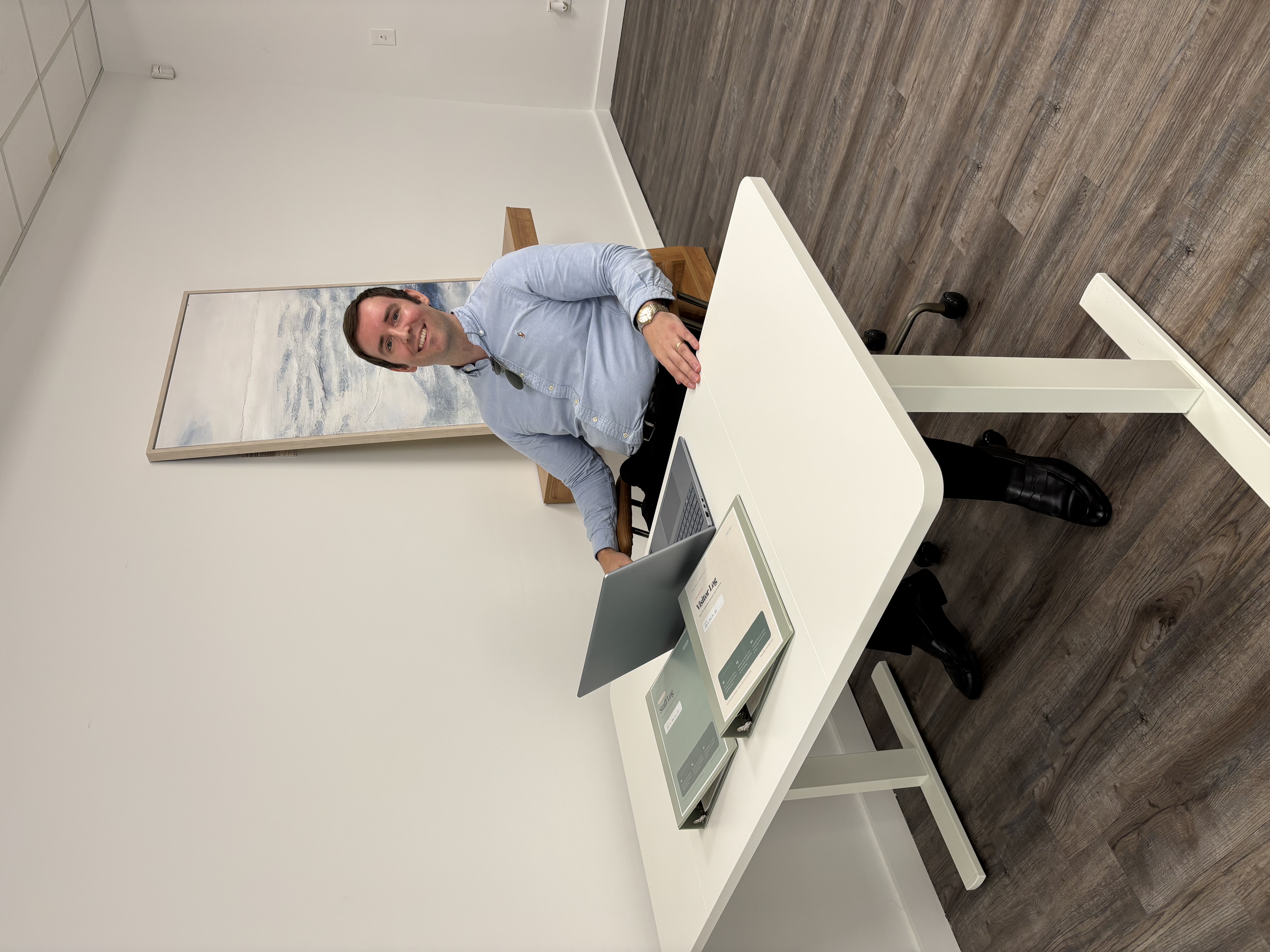 Matt Michaels, Ph.D., founder of Greet Health, at his desk